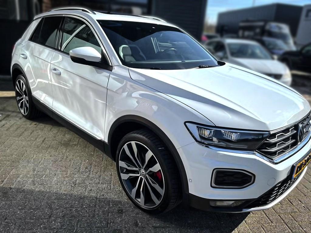Volkswagen T-Roc 2.0 TSI 190pk 4Motion 7-DSG | Trekhaak, Auto's, Volkswagen, Automaat, 15 km/l, Leder en Stof, Wit