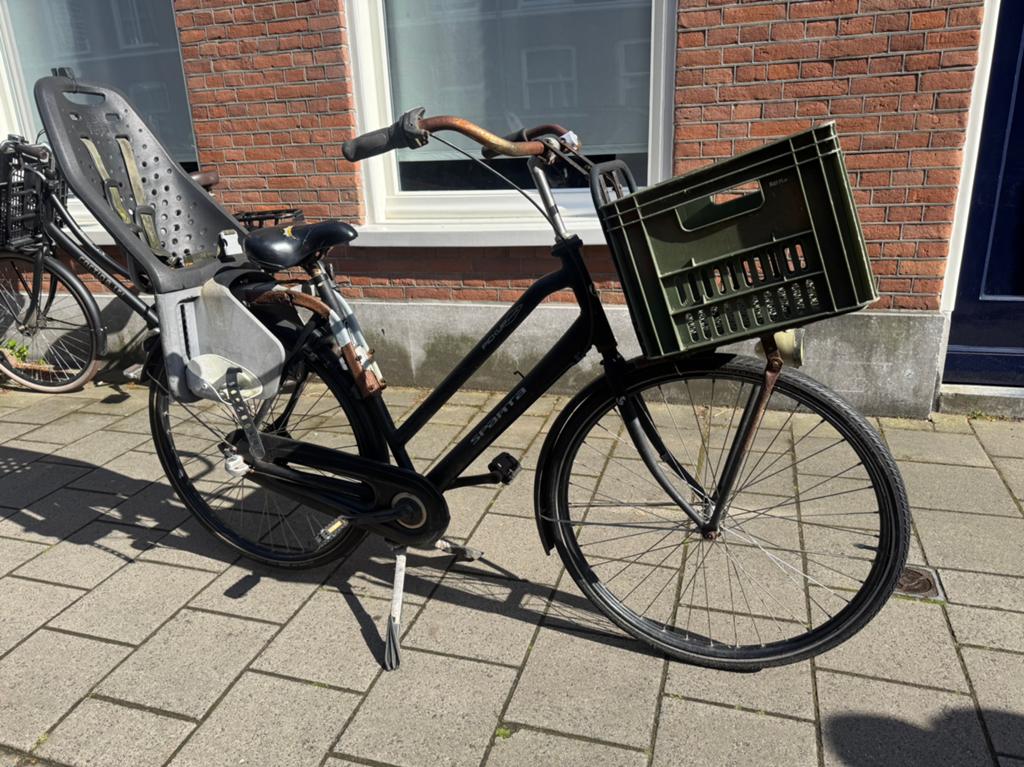 Damesfiets Sparta pick up met kinderzitje., Ophalen, Terugtraprem, Sparta, Versnellingen