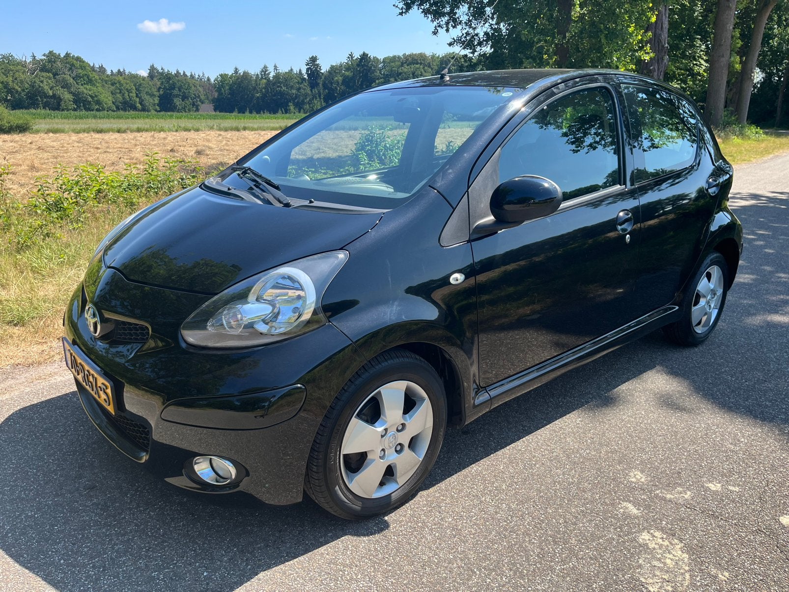 Toyota Aygo 1.0 12V Vvt-i 5DRS 2011 Zwart APK Airco 56042km, Auto's, Toyota, Bedrijf, Aygo, ABS, Airbags, Airconditioning, Centrale vergrendeling