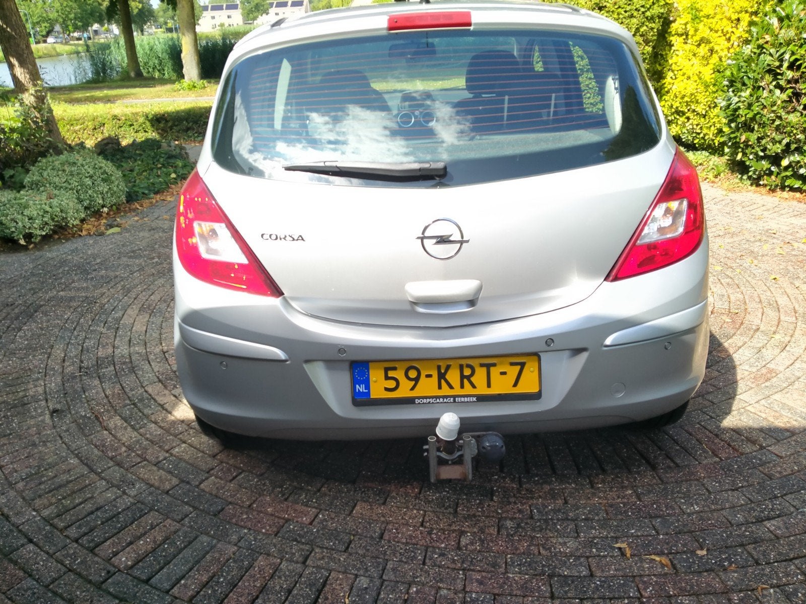 Opel Corsa 1.4 16V 5D 2010 Grijs, Auto's, Opel, Voorwielaandrijving, 1063 kg, 4 cilinders, Leder en Stof
