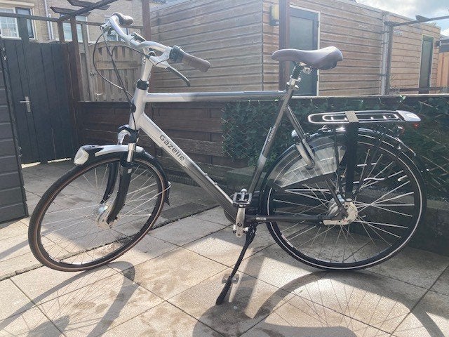 Te koop zo goed als nieuwe Gazelle herenfiets (65 cm), Ophalen, Versnellingen, Zo goed als nieuw, 65 cm of meer