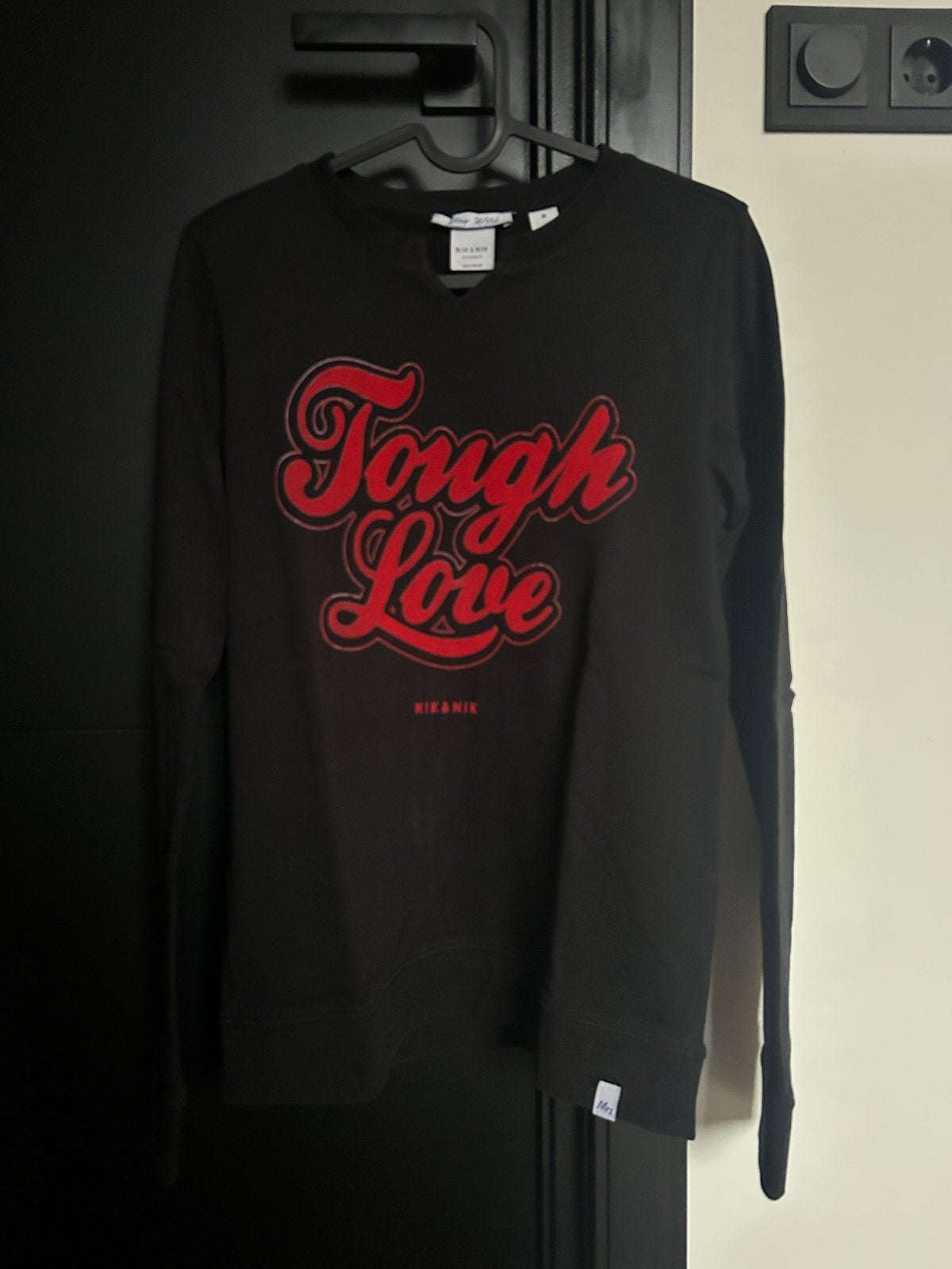 NIK&NIK Trui 'Tough Love' Zwart - Maat 16/176 nikkie, Kinderen en Baby's, Kinderkleding | Maat 176, Ophalen of Verzenden, Zo goed als nieuw