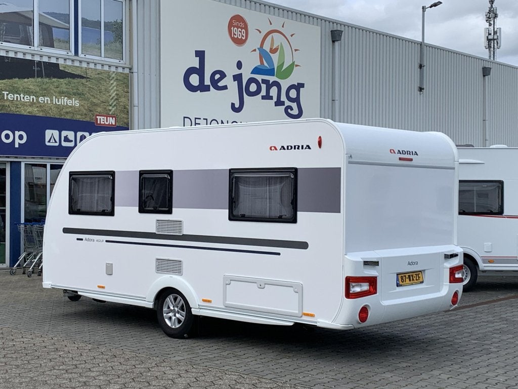 Adria Adora 462 UP - Isabella Voortent -, Caravans en Kamperen, Caravans, Rondzit, Bedrijf, Schokbreker, 5 tot 6 meter