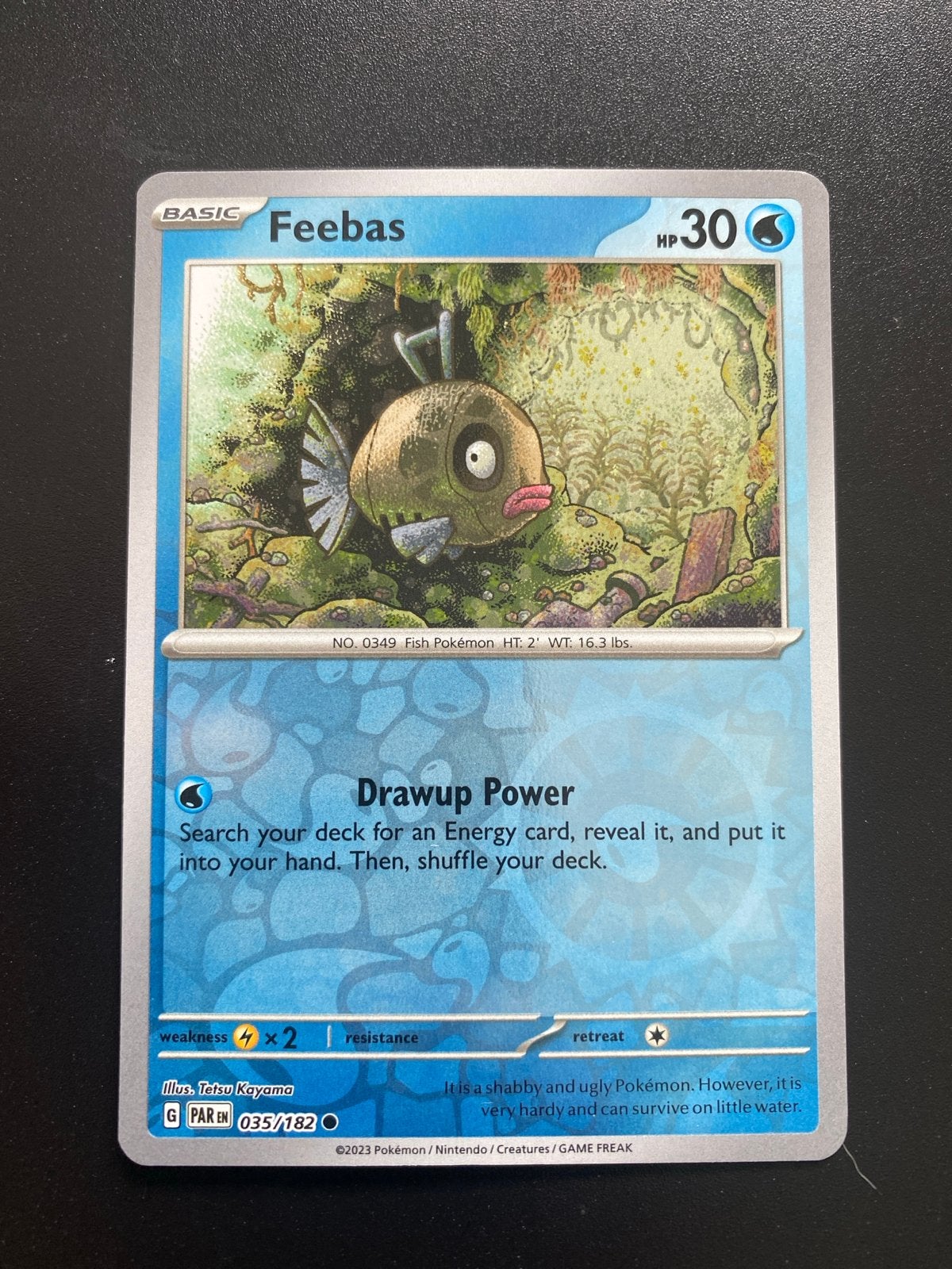 Feebas 035/182 Reverse Holo Pokémon Paradox Rift, Ophalen of Verzenden, Zo goed als nieuw, Losse kaart, Foil