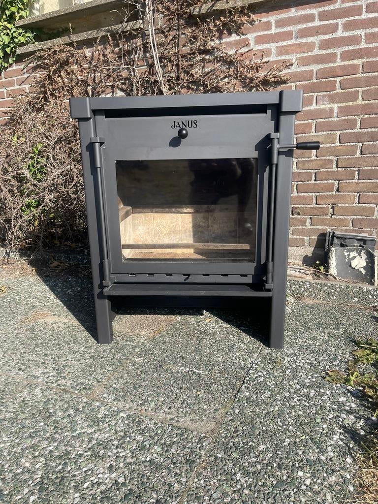Tekoop JANUS 14 houtkachel achter aansluiting 10/14 kw, Huis en Inrichting, Kachels, Houtkachel, Ophalen of Verzenden, Zo goed als nieuw