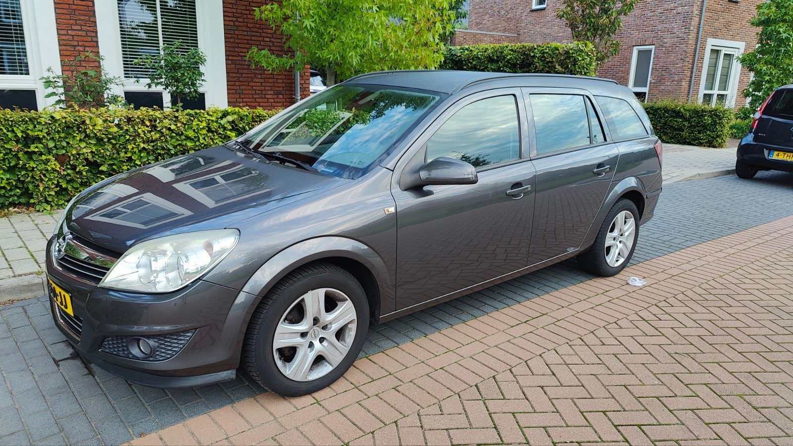 Astra 1.6 Cosmo PDC | Stoelverw | Navi | Trekhaak., Auto's, Voorwielaandrijving, Dealer onderhouden, Navigatiesysteem, Zwart
