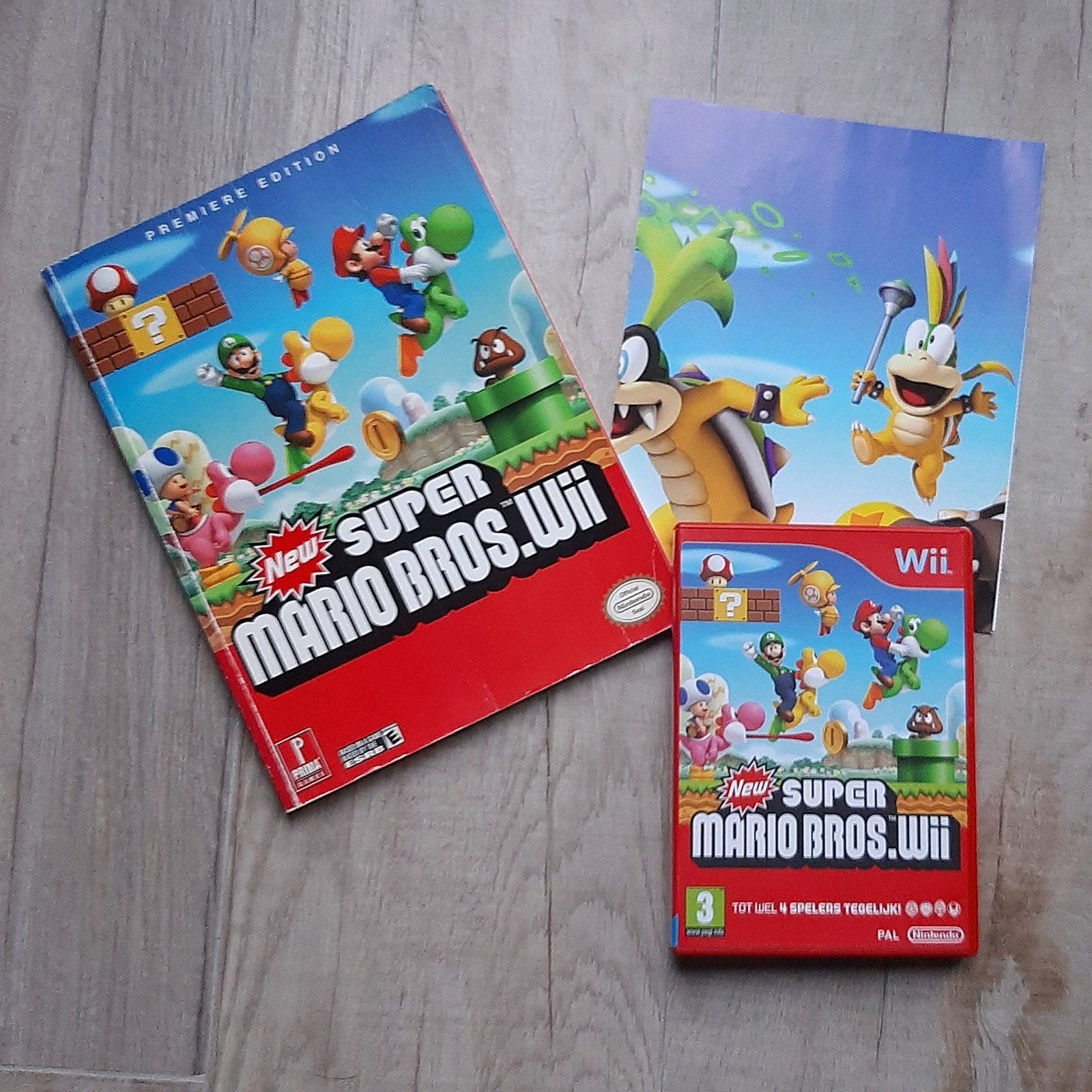 Wii Spel+ Boek Super Mario Bros, 3 spelers of meer, Ophalen of Verzenden, Zo goed als nieuw, Vanaf 3 jaar