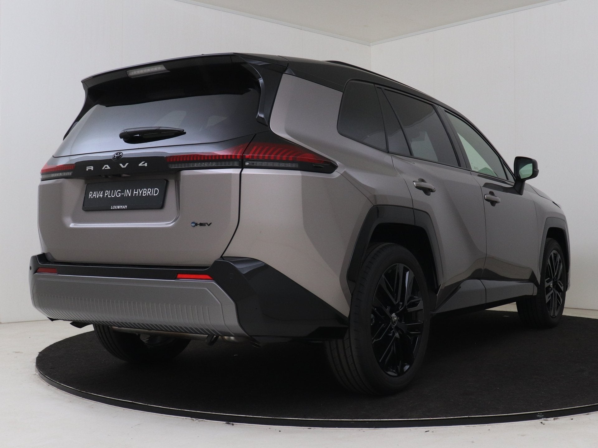 Toyota RAV4 2.5 Hybrid 200 First Edition | DEMO & SNEL LEVER, Zwart, 4 cilinders, Beige, Bedrijf