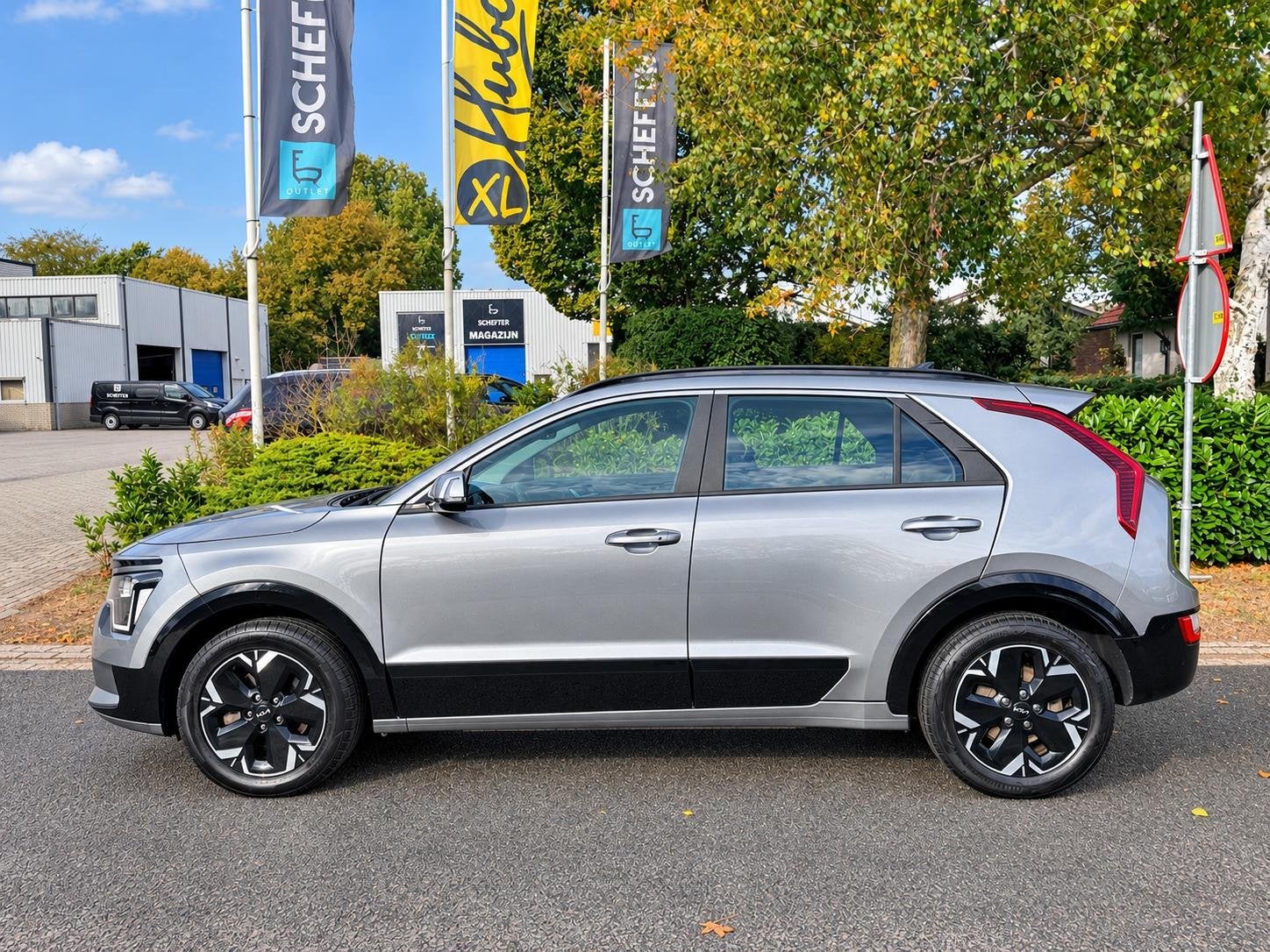 Kia Niro EV DynamicLine 64.8 kWh 204PK 1e EIGENAAR, Gebruikt, Verwarmde buitenspiegels, 1657 kg, Leder en Stof