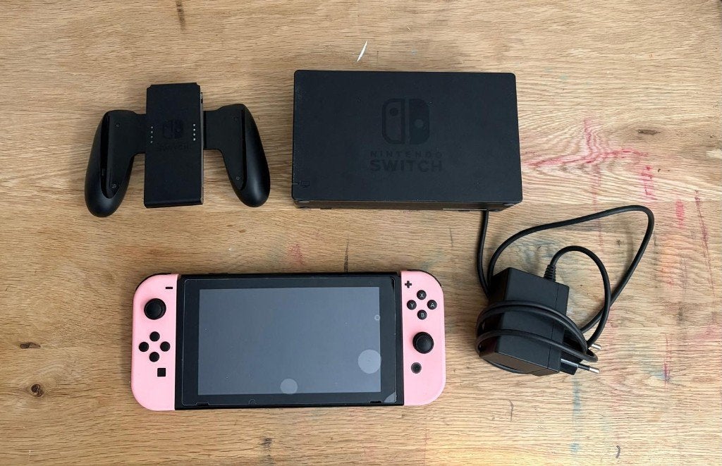 Nintendo Switch 2019 upgrade met accessoires en games, Switch 2019 Upgrade, Ophalen of Verzenden, Zo goed als nieuw, Met harde schijf