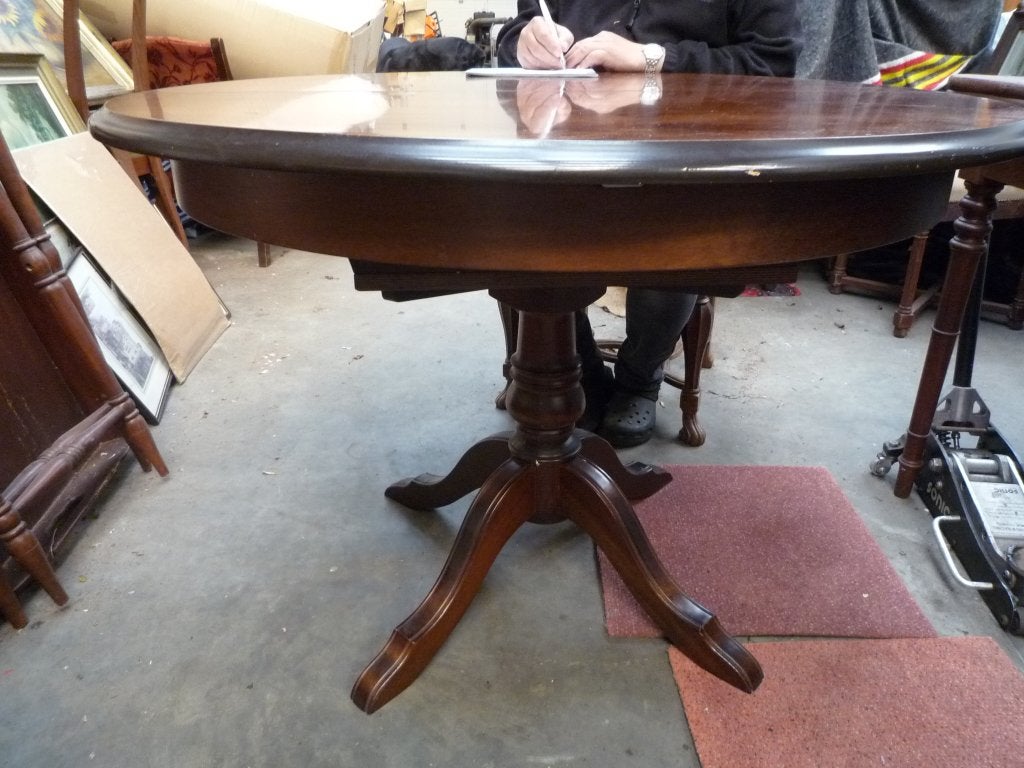 Antieke uitschuifbare eettafel van donker hout, Ophalen