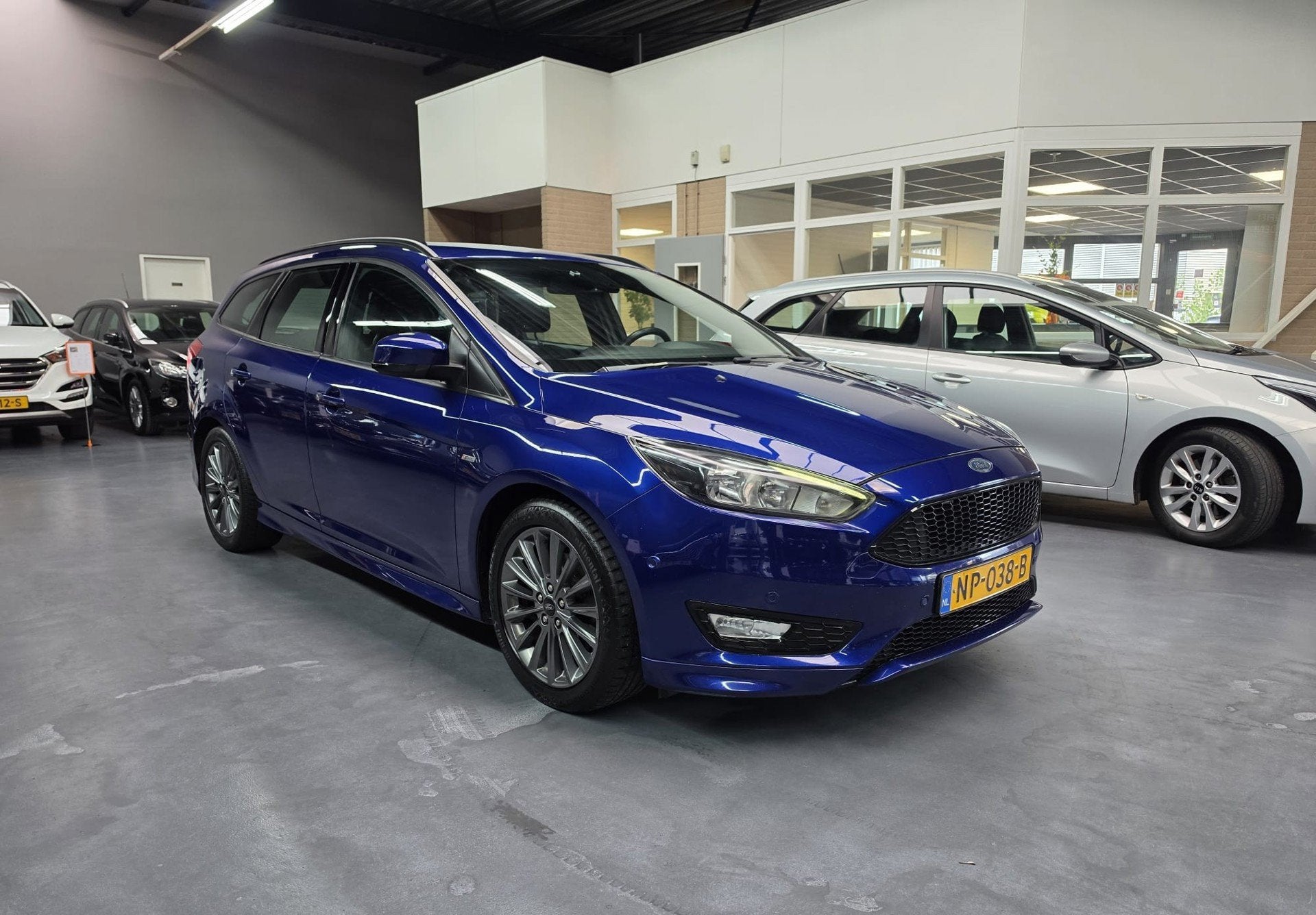 Ford Focus Wagon 1.5 ST-Line CARPLAY AUTO PARK KEYLESS NAVI, Auto's, Dealer onderhouden, Euro 6, 4 cilinders, Blauw