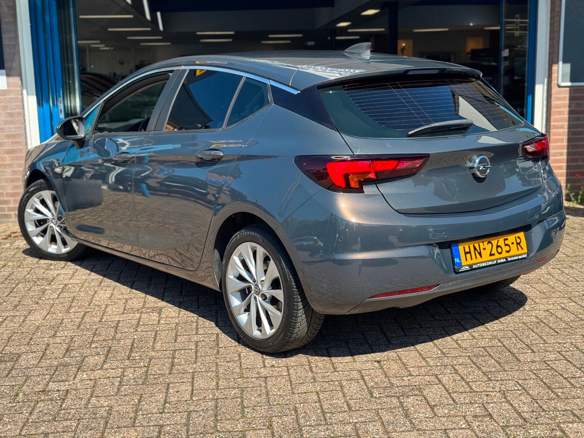 Opel Astra 1.0 Edition 2015 NAVI CLIMA TREKH LM APK NAP!, Auto's, Opel, Stof, Gebruikt, 610 kg, 23 km/l