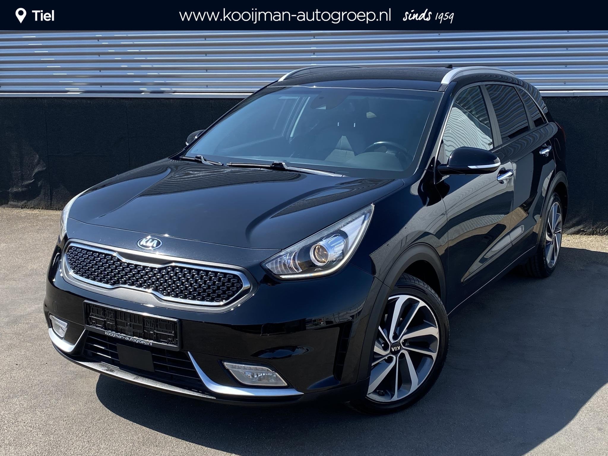 Kia Niro 1.6 GDi Hybrid DynamicLine Edition Navigatie, Apple, Auto's, Gebruikt, Euro 6, 2 kWh, Leder en Stof