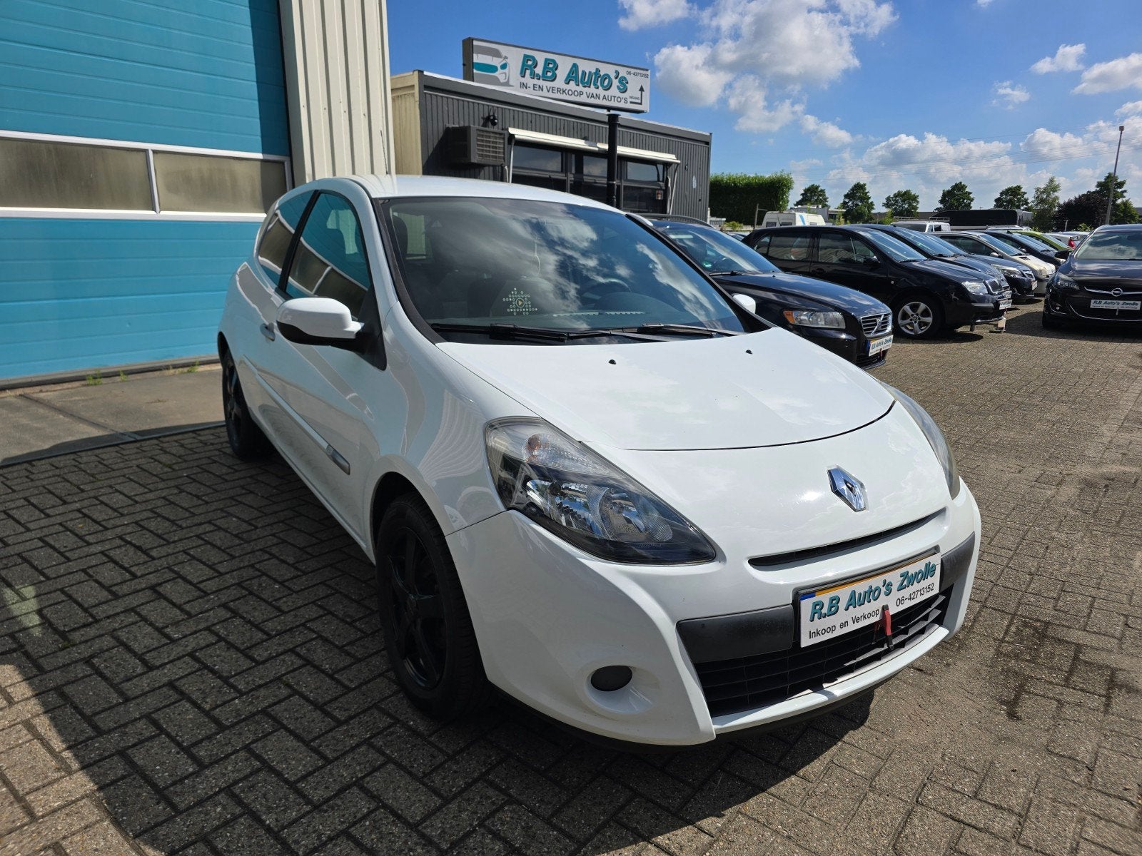 Renault Clio 1.2 16V 55KW 3-DRS E4 2011 Wit, Auto's, Voorwielaandrijving, Euro 5, Zwart, 4 cilinders