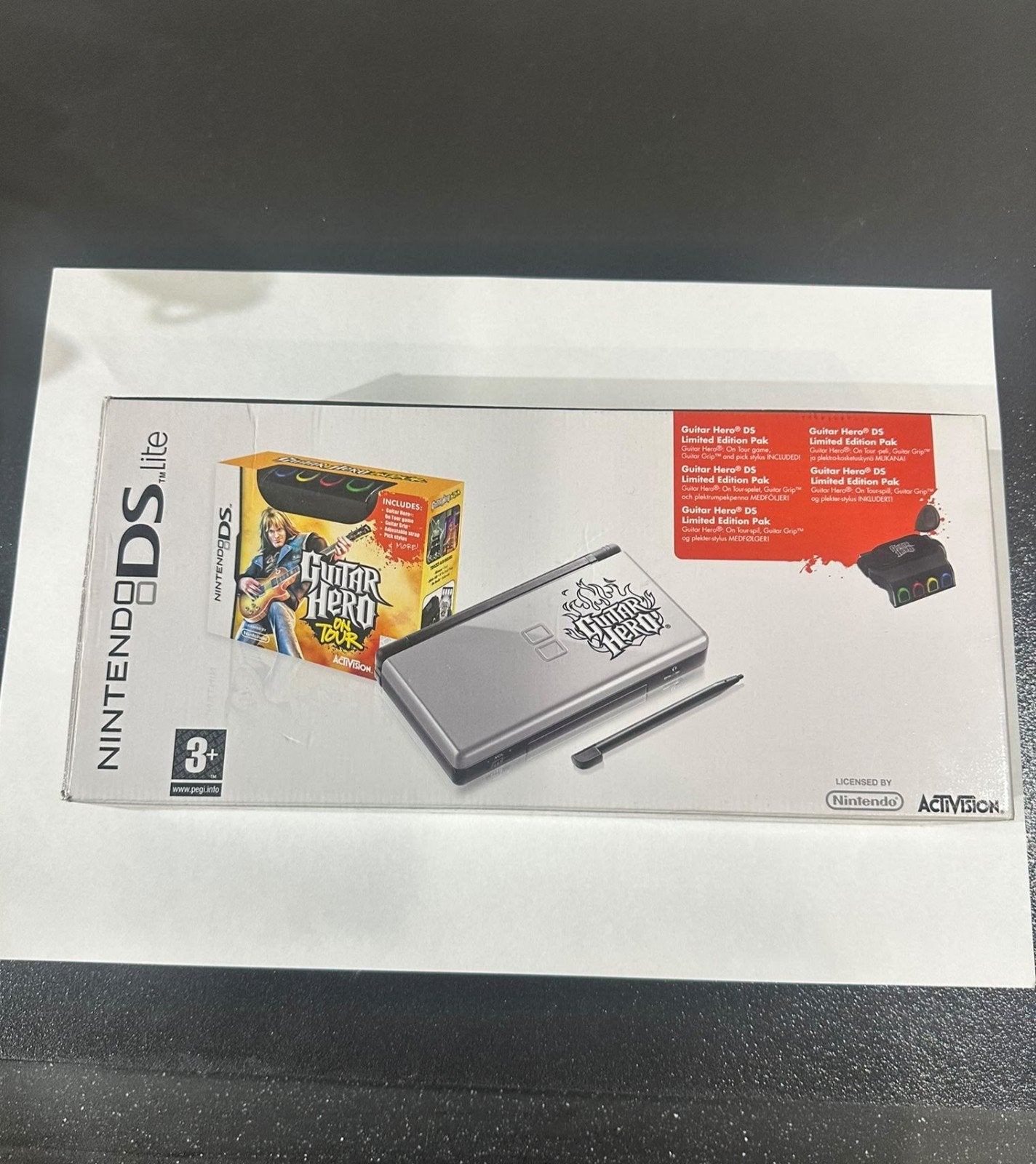 Nintendo DS Lite Zwart  met Guitar Hero On Tour Pakket, Spelcomputers en Games, Ophalen, Zwart, DS Lite, Gebruikt