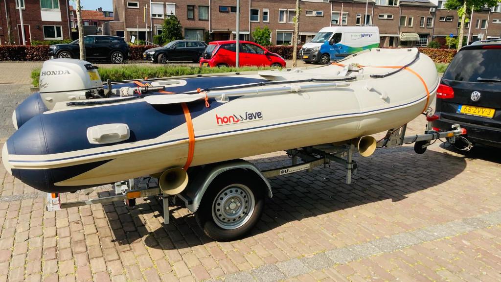 Honwave T40 rubberboot 7-p. Kalf kanteltrailer en Honda 8PK, Watersport en Boten, Ophalen, Aluminium, Zo goed als nieuw, Benzine