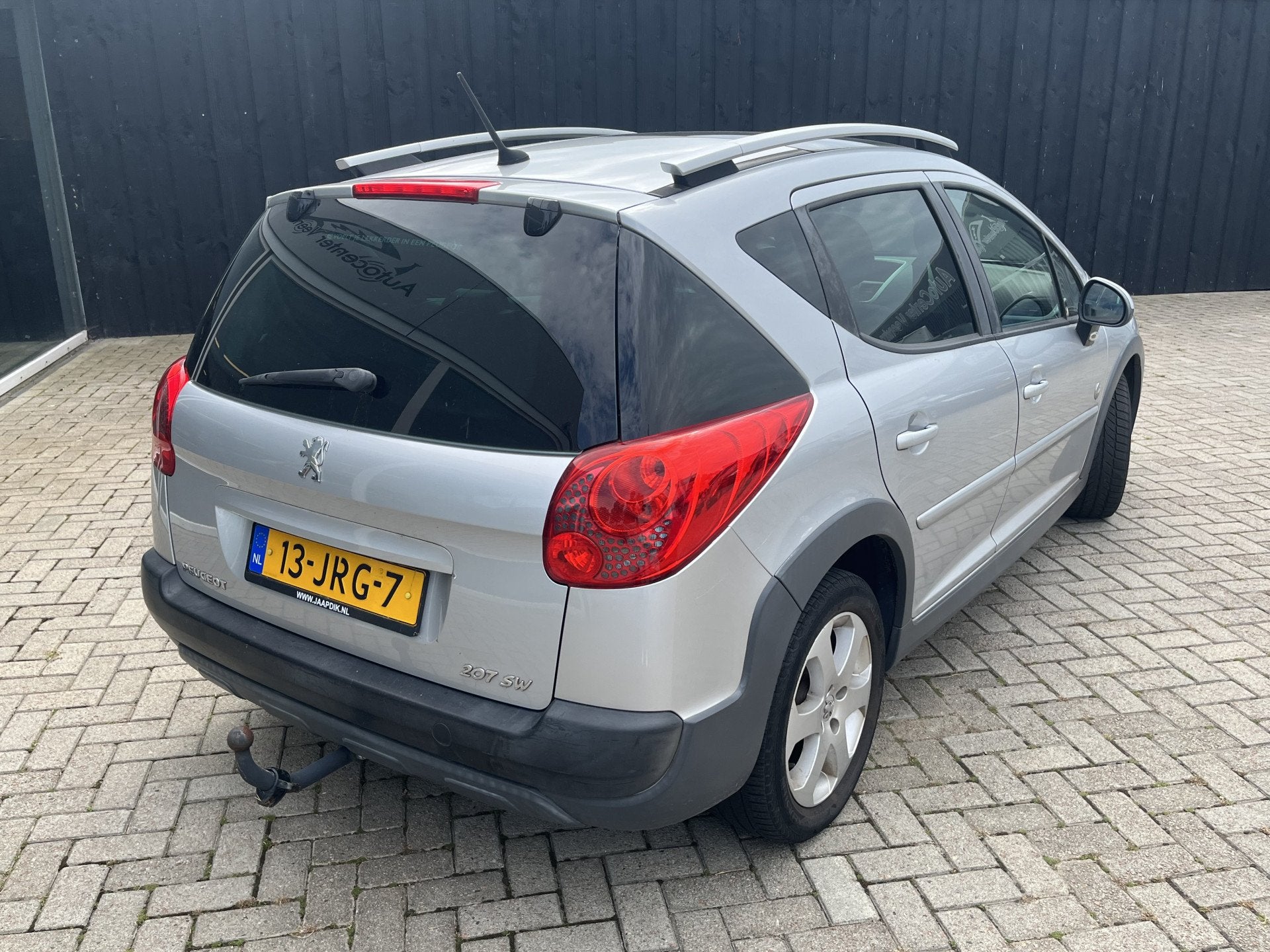 Peugeot 207 SW Outdoor 1.6 VTi Sublime / Half Leer / Cruise, Gebruikt, Zwart, 4 cilinders, Leder en Stof