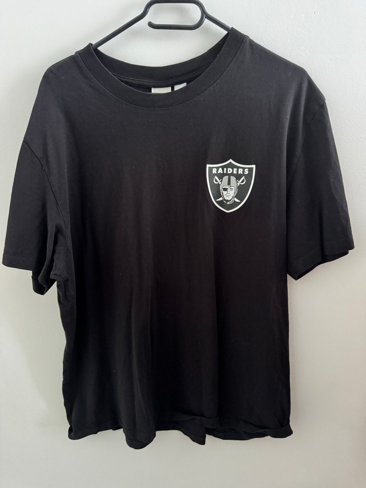 Zwart Raiders T-shirt - Maat XL, Ophalen of Verzenden, Gedragen, Maat 52/54 (L), Zwart