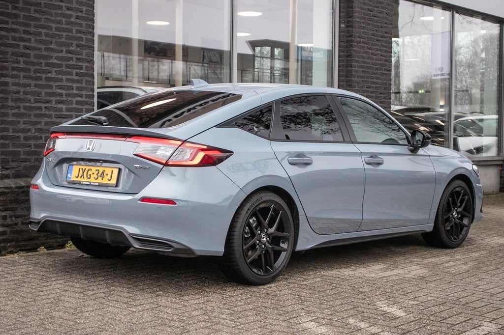 Honda Civic 2.0 e:HEV Sport | Honda Sensing | Apple cp/Andro, Auto's, Honda, Automatische klimaatregeling, Stof, Gebruikt, 4 cilinders