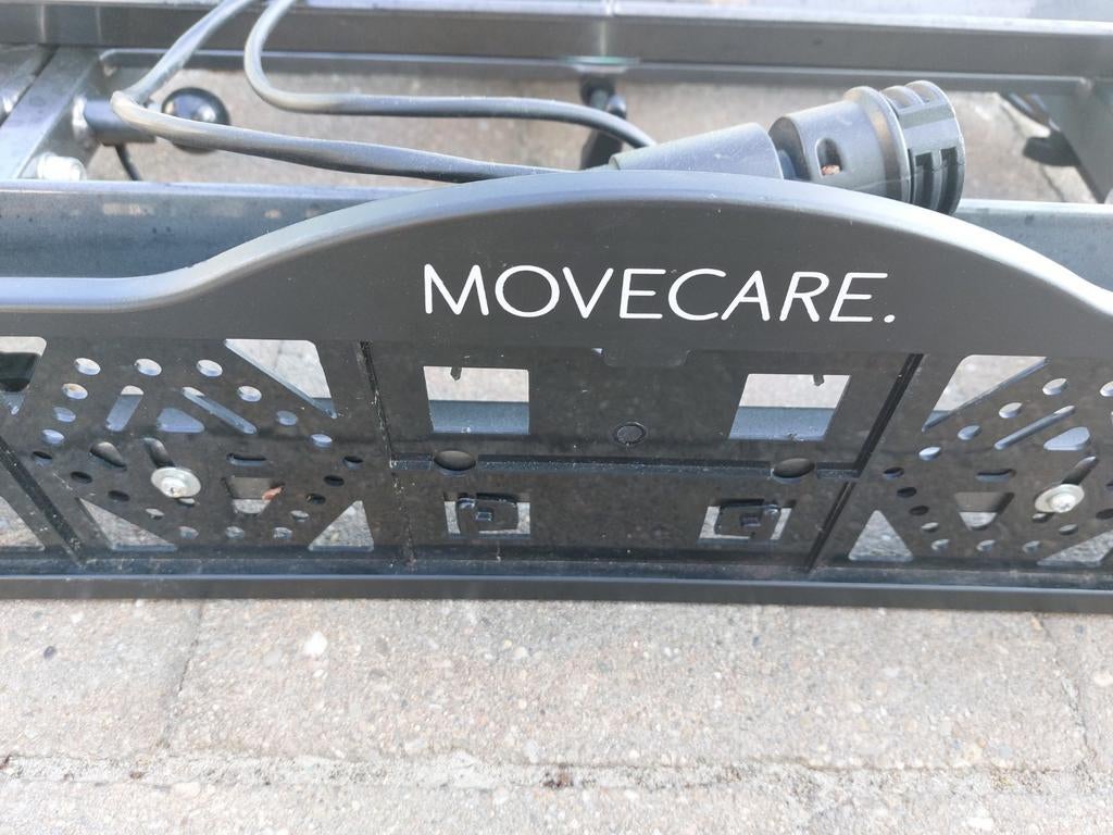 Movecare. Fietsendrager, Ophalen