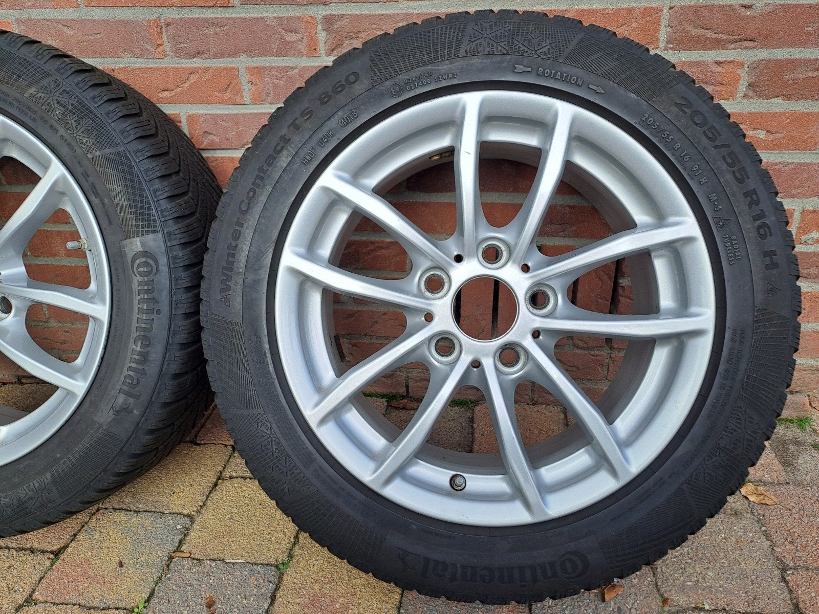 Winterbanden Continental op originele BMW 118i velgen., Ophalen, Gebruikt, 16 inch, Banden en Velgen