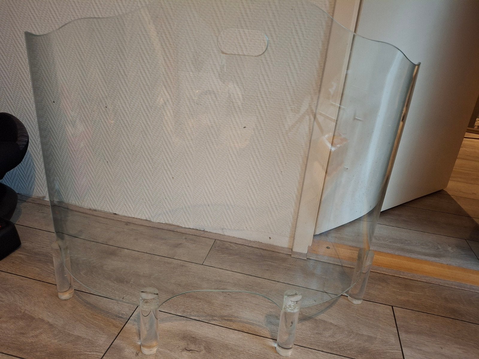 Transparant openhaardscherm van plexiglas, Ophalen
