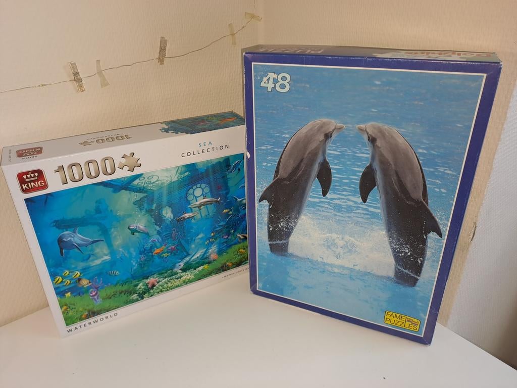 2 dolfijnen puzzels, Ophalen of Verzenden, 500 t/m 1500 stukjes, Zo goed als nieuw, Legpuzzel