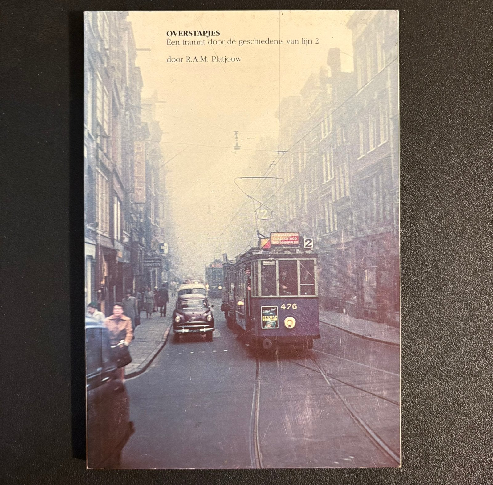 Overstapjes - tramrit door de geschiedenis van lijn 2 (1989), Ophalen of Verzenden, Zo goed als nieuw, Tram, Boek of Tijdschrift