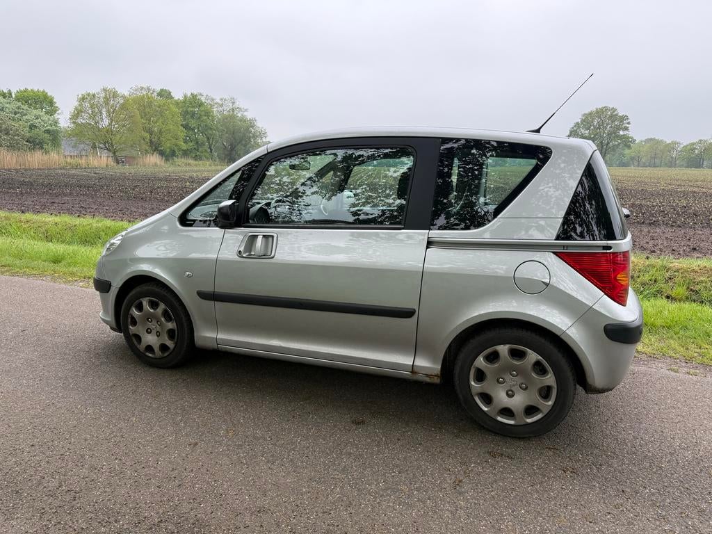 Peugeot 1007 1.4 2005 Airco, Cruise, afneembare trekhaak., Auto's, Voorwielaandrijving, 1360 cc, 4 cilinders, 4 stoelen