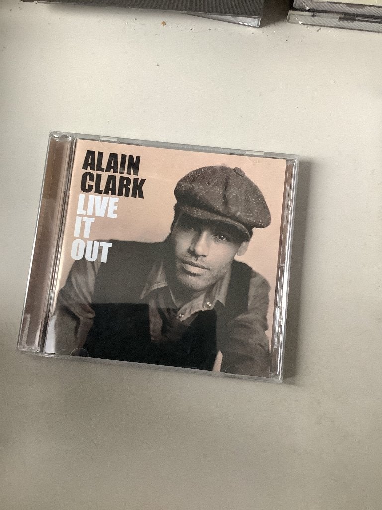 Alain Clark,live it out., Ophalen of Verzenden