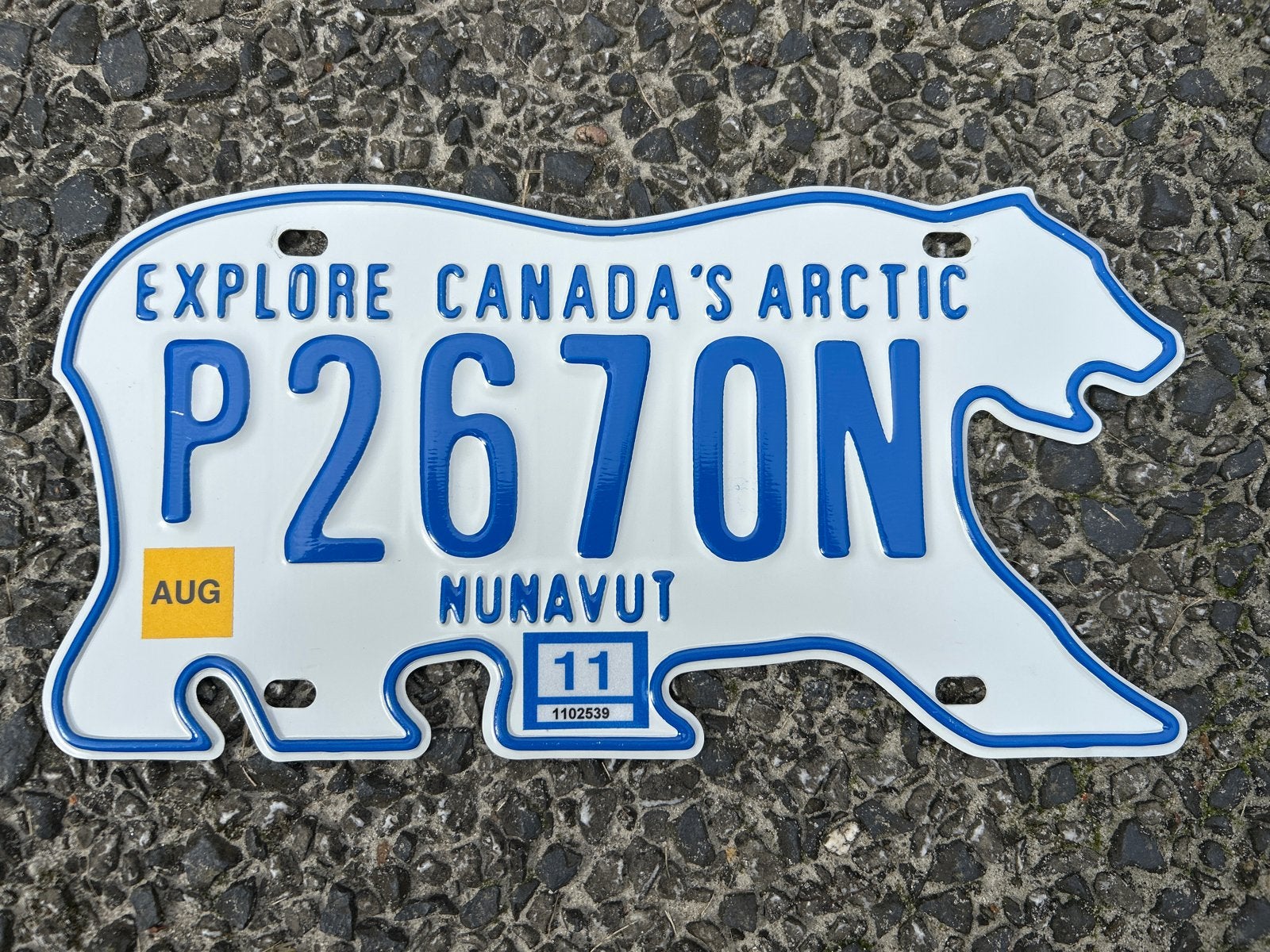 Canadees Nunavut nummerbord - IJsbeer vorm, Verzamelen, Ophalen of Verzenden, Gebruikt, Auto's