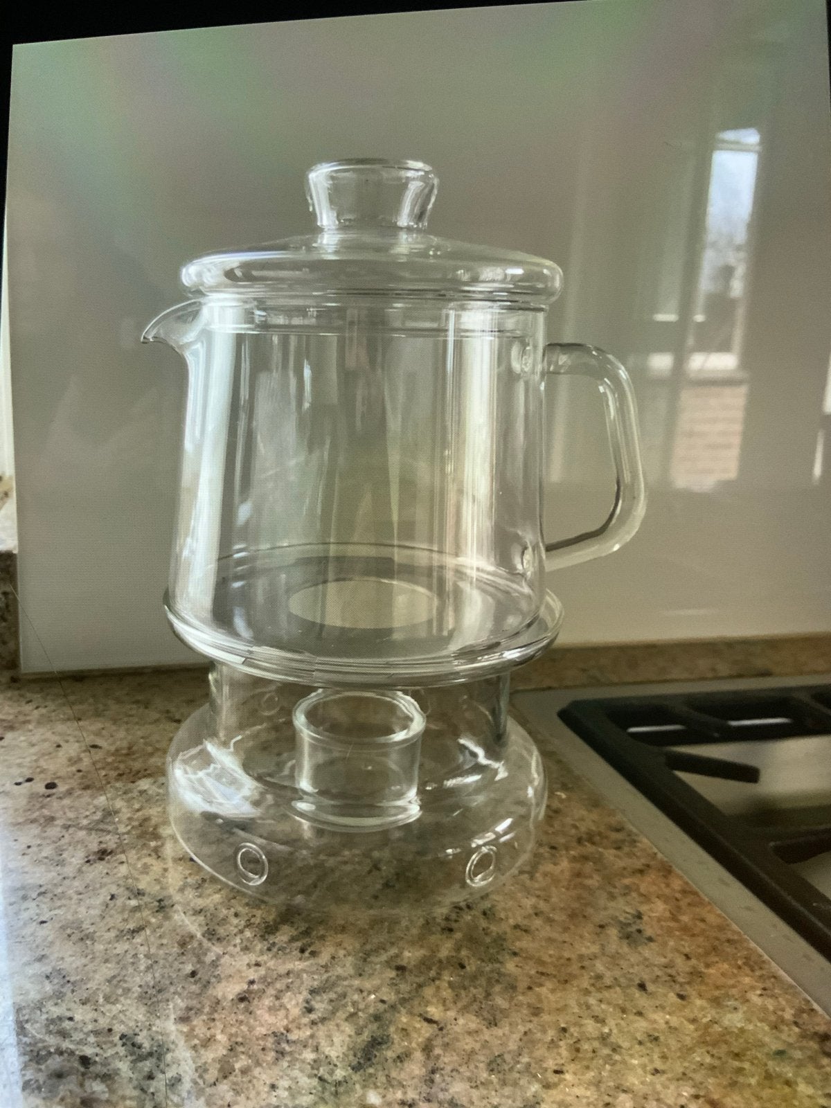 Glazen theepot met theelichtwarmer, Theepot/fluitketel, Ophalen of Verzenden, Zo goed als nieuw, Glas