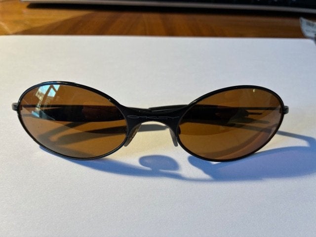 Oakley E-Wire vintage zonnebril bruine lenzen + hoesje, Gebruikt, Zonnebril, Bruin, Ophalen of Verzenden
