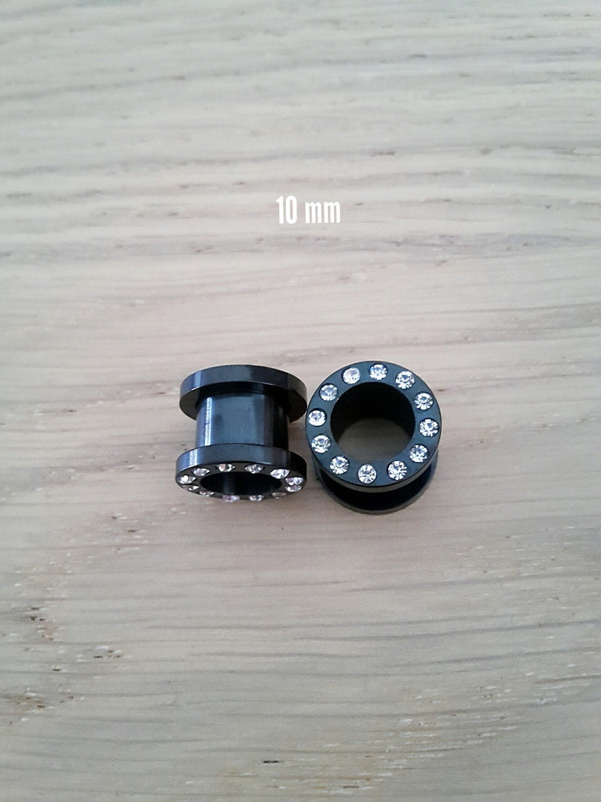 Nieuwe tunnels, pluggen. Staal. Zwart. Steentjes., Sieraden, Tassen en Uiterlijk, Piercings, Ophalen of Verzenden, Zo goed als nieuw