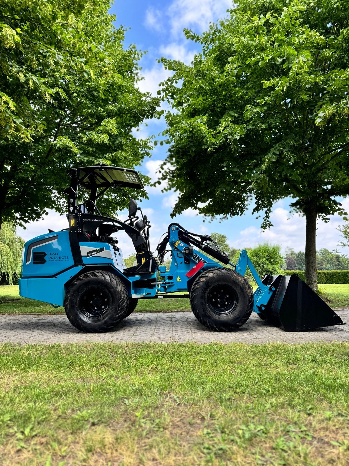 Te huur: Compacte Giant kniklader met aanhanger, Ophalen