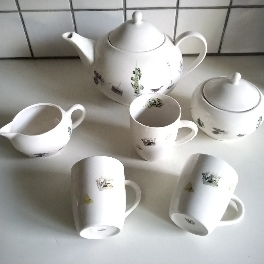 H v D theepot met roomstel en 3 mokjes met oa koolmezen, Huis en Inrichting, Overige typen, Ophalen of Verzenden, Zo goed als nieuw