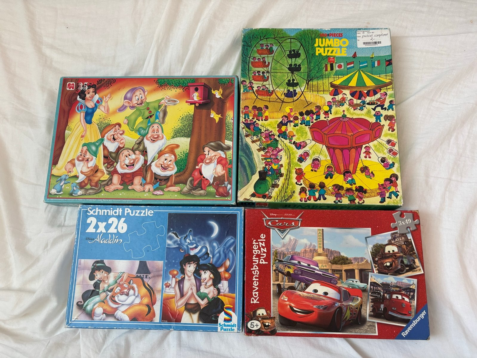 Diverse kinderpuzzels: Aladdin, Sneeuwwitje, Cars, Kermis, Ophalen, 10 tot 50 stukjes, Gebruikt, 4 tot 6 jaar