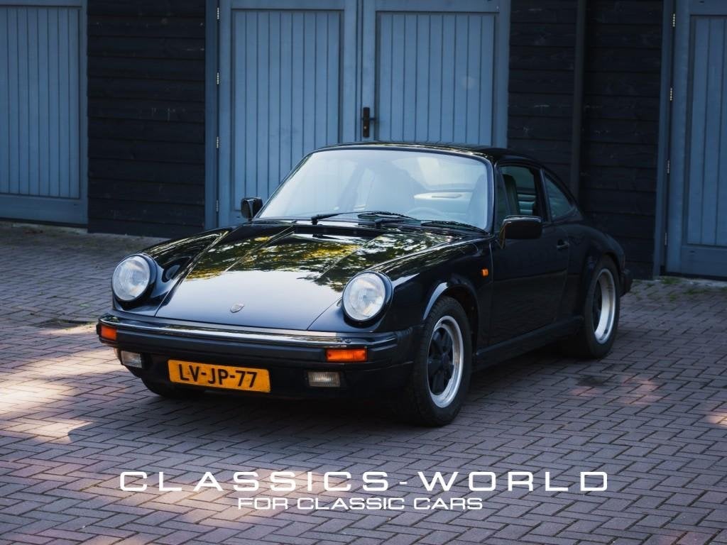 Porsche 911 3.2 Carrera Coupé - Satin Black Metallic, Auto's, Achterwielaandrijving, Gebruikt, 1188 kg, Zwart