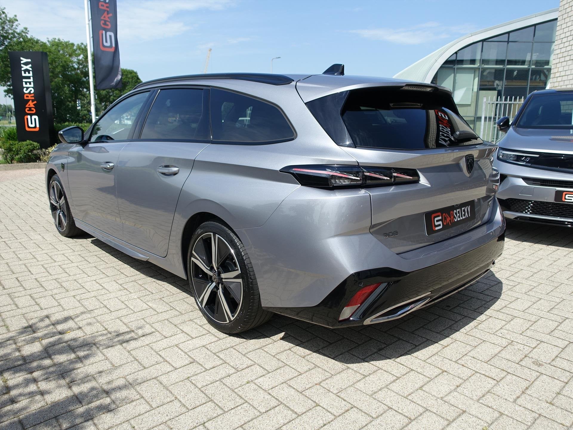 PEUGEOT 308 Sw 1.2 Hybrid 145pk e-DCS6 GT Supermooie Auto, Auto's, Gebruikt, 1199 cc, Automatische klimaatregeling, Hybride Elektrisch/Benzine