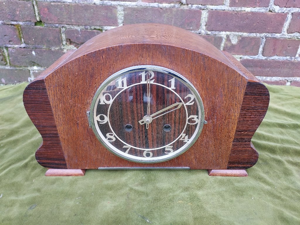 Art Deco schoorsteenpendule met coromandelhout., Antiek en Kunst, Ophalen of Verzenden