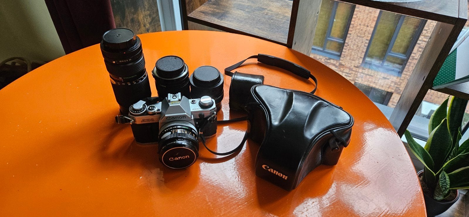 Canon AE-1 – prachtige staat + complete set met 4 lenzen, Audio, Tv en Foto, Ophalen of Verzenden, Zo goed als nieuw, Spiegelreflex