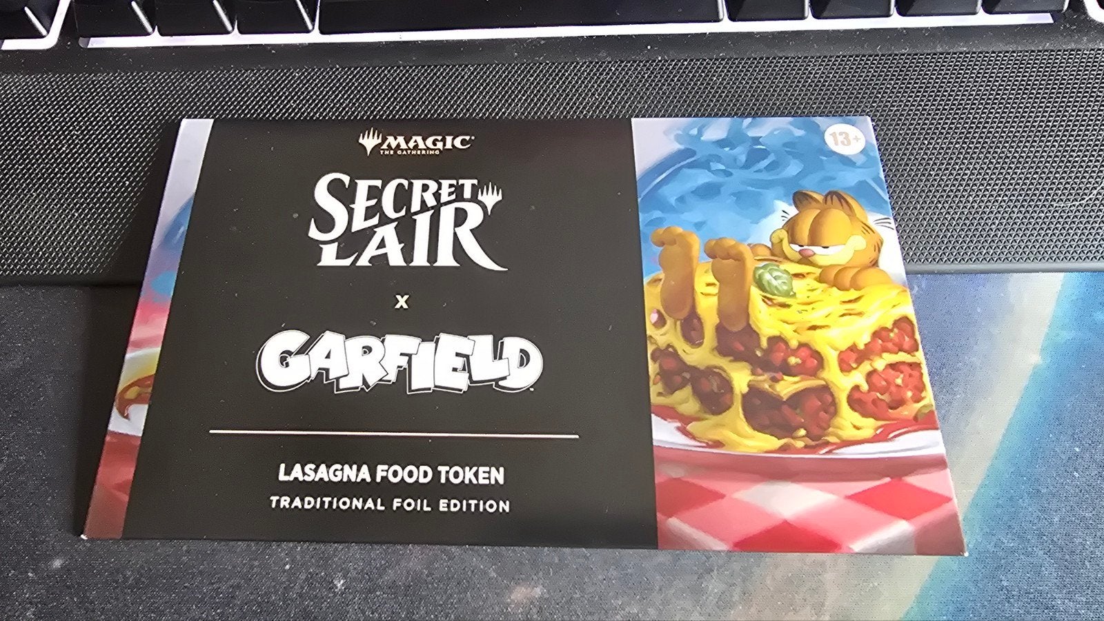 Magic: The Gathering Secret Lair x Garfield Lasagna Token, Ophalen, Nieuw, Losse kaart, Foil