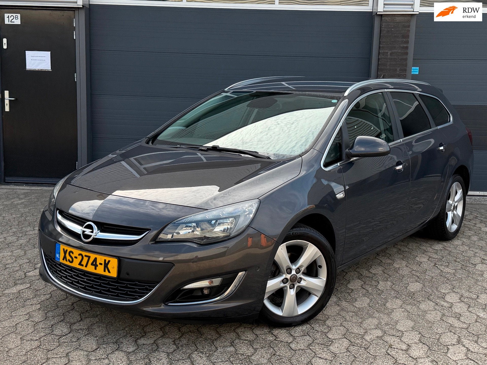 Opel Astra Sports Tourer 1.4 Turbo Sport|NAVI|CAMERA|LEER|CL, Voorwielaandrijving, Euro 5, 15 km/l, Gebruikt