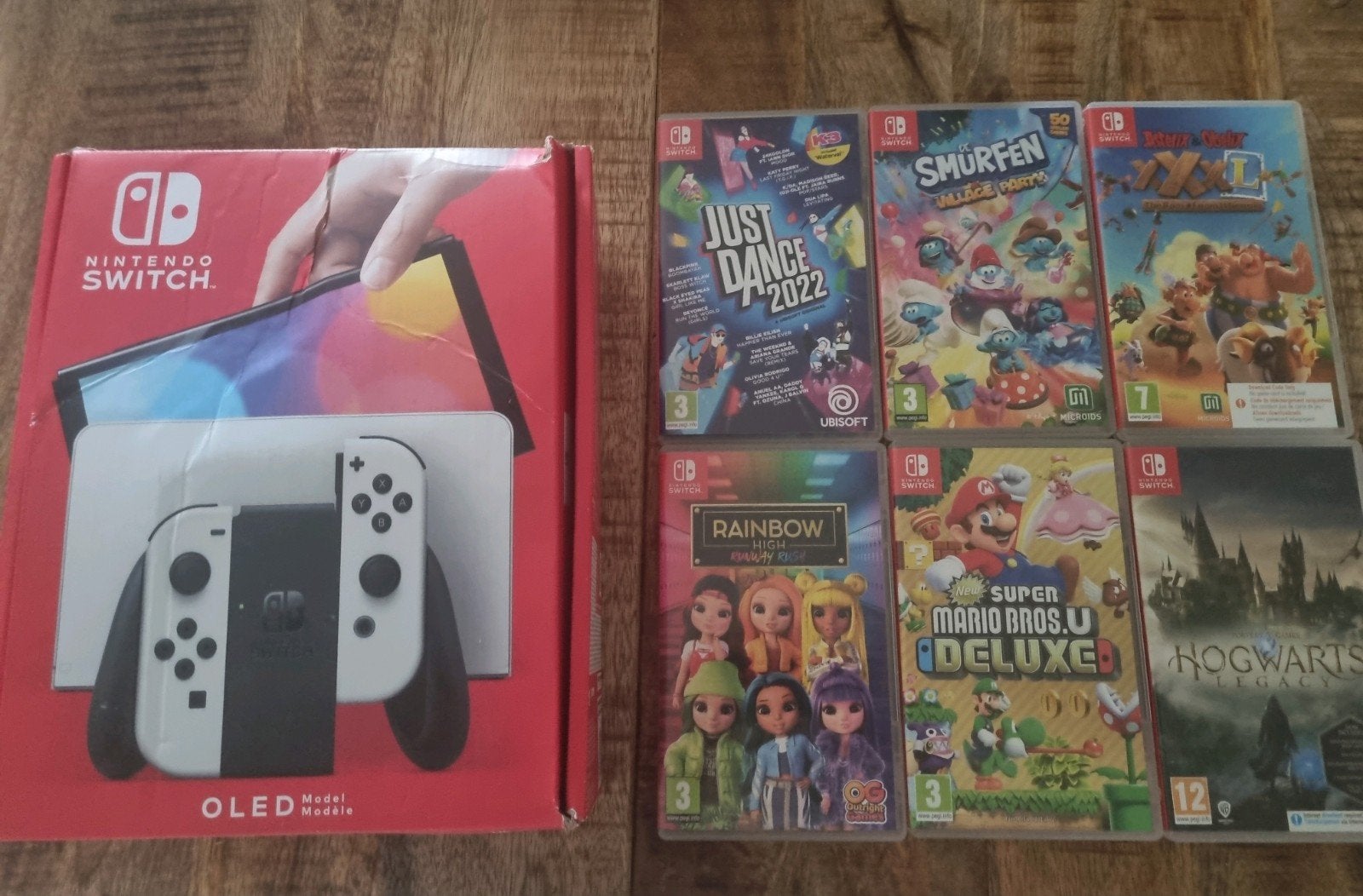 Nintendo Switch OLED met 6 games en accessoires, Spelcomputers en Games, Met games, Met 2 controllers, Zo goed als nieuw, Switch OLED