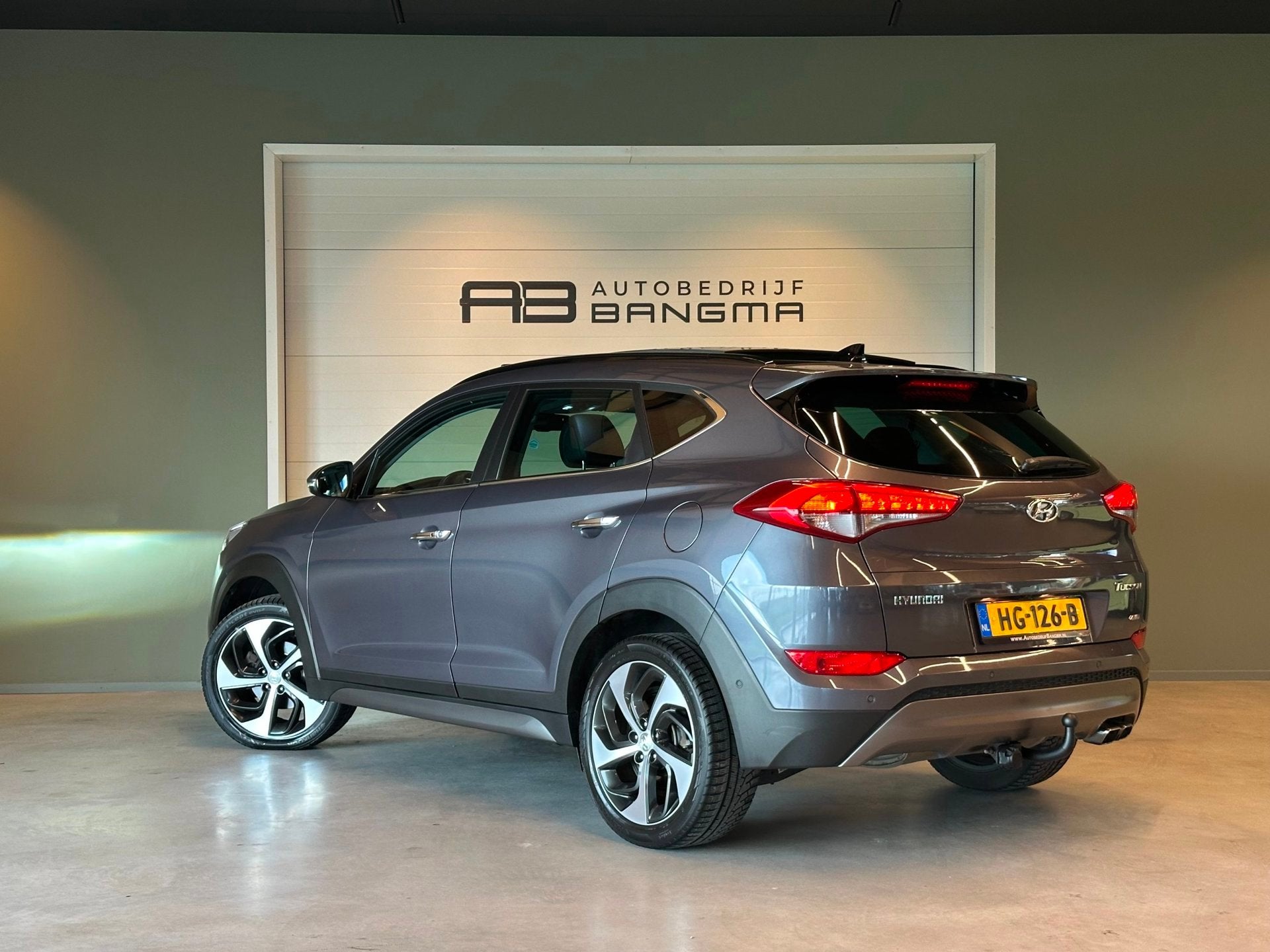 Hyundai Tucson 1.6 T-GDi 4WD AUTOMAAT PREMIUM|CLIMA AIRCO|PA, Auto's, Dealer onderhouden, Gebruikt, 4 cilinders, Met garantie (alle)