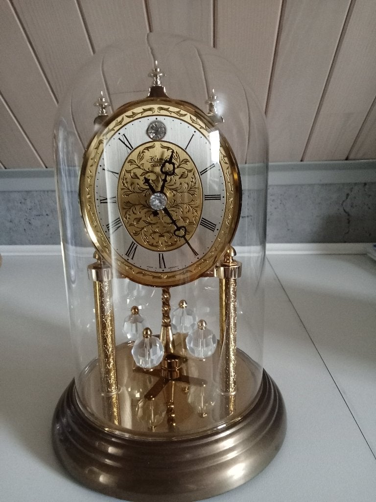 Nog werkende pendule klok met glazen stulp, Ophalen