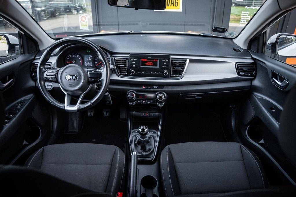 Kia Rio 1.2 CVVT ComfortLine*AIRCO*BLUETOOTH*STOELVERWARMING, Auto's, 1027 kg, Gebruikt, 4 cilinders, Elektrische ramen
