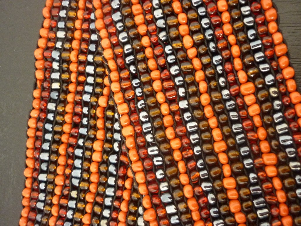 Ceintuur met houten gesp / riem met kralen / oranje bruin, Minder dan 80 cm, Tailleriem, Ophalen of Verzenden, Zo goed als nieuw