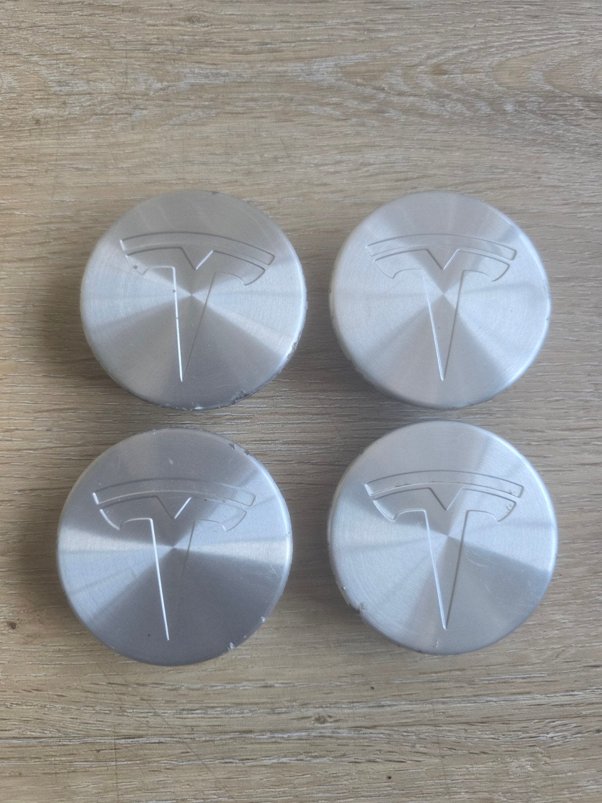 Set van 4 originele Tesla wieldoppen - Zilverkleurig, Ophalen of Verzenden, Gebruikt